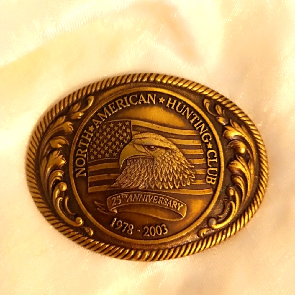 North American Hunting Club 25th anniversary western brass belt buckle